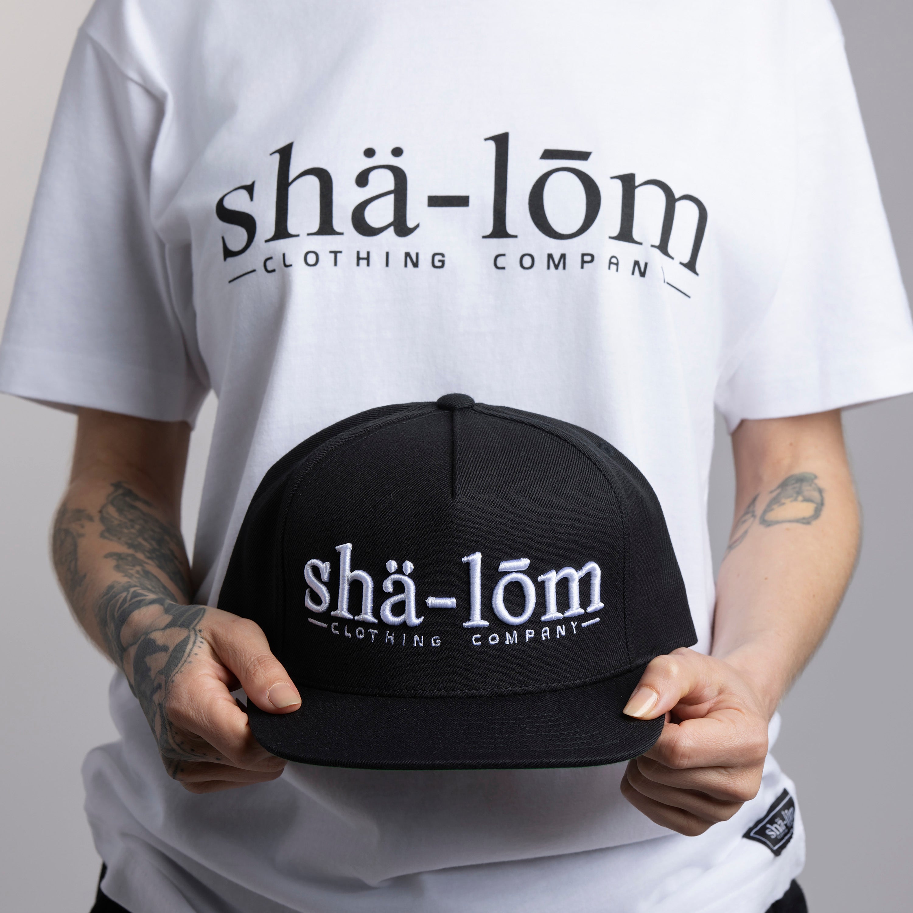 Shalom Definition Tee – More Than a Word, a Way of Life
The Shalom Definition Tee is the foundation of our brand, representing a word far deeper than just “peace.” In Hebrew, Shalom (שׁלום) embodies wholeness, completeness, and well-being—a state where nothing is missing and nothing is broken. It’s a greeting, a blessing, and a way of life.
