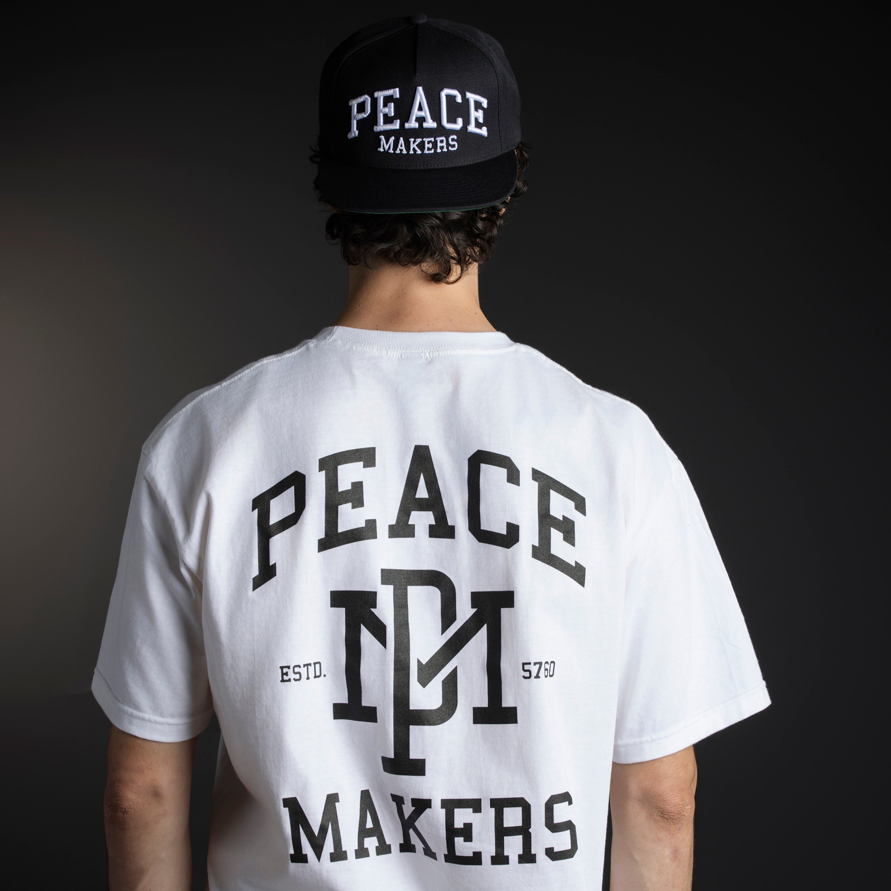 Our Peace Makers Hat is a statement of unity, purpose, and style. This Premium Five-Panel Snapback Cap is built on a classic Yupoong 5-panel pinch front, offering a timeless fit that suits most head sizes comfortably. Whether you're repping peace on the streets or just adding a clean, versatile piece to your wardrobe, this hat delivers.
Pair it with our Peace Makers Tees, Hoodies, and Sweats for the ultimate look—because spreading peace isn’t just a mindset, it’s a movement.
