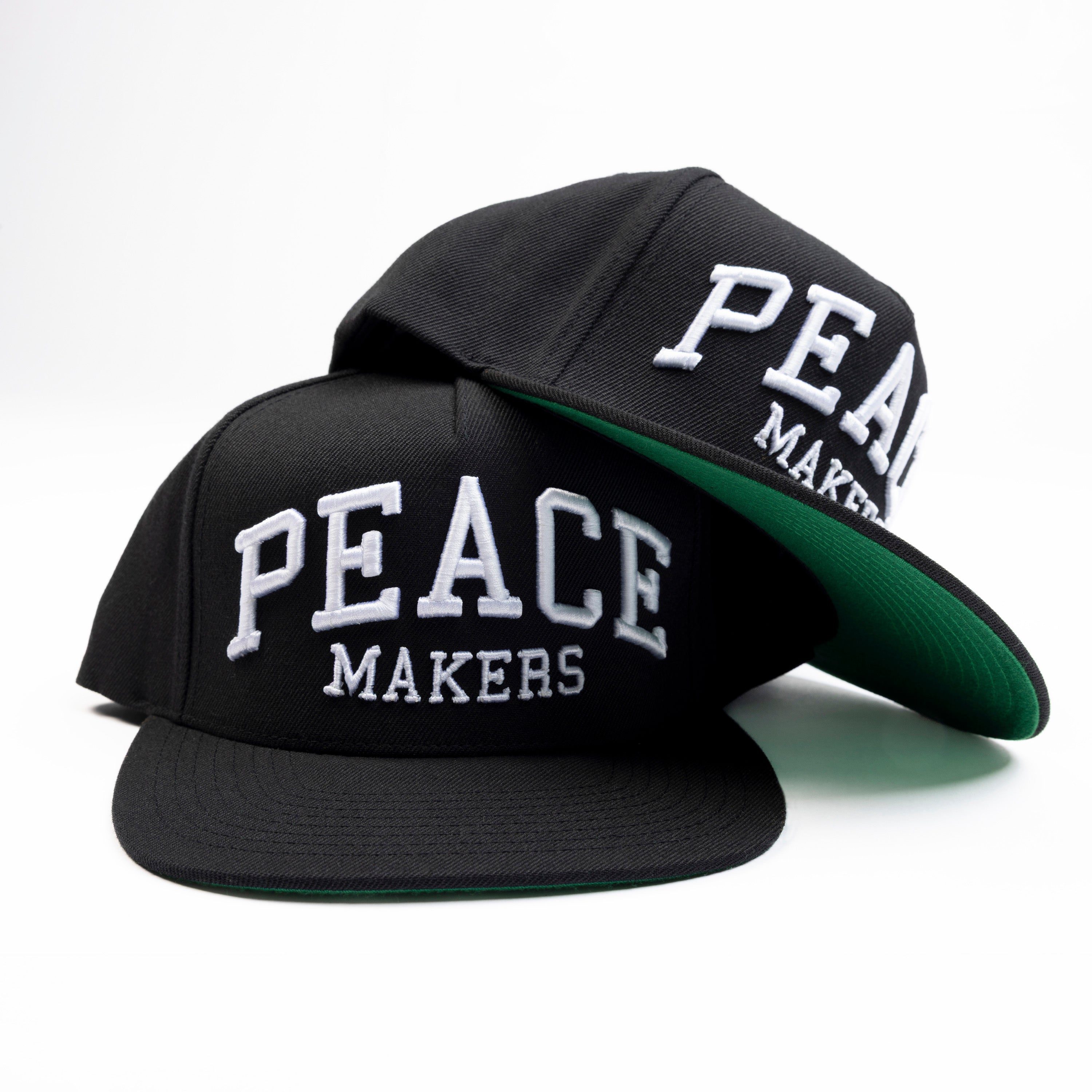Our Peace Makers Hat is a statement of unity, purpose, and style. This Premium Five-Panel Snapback Cap is built on a classic Yupoong 5-panel pinch front, offering a timeless fit that suits most head sizes comfortably. Whether you're repping peace on the streets or just adding a clean, versatile piece to your wardrobe, this hat delivers.
Pair it with our Peace Makers Tees, Hoodies, and Sweats for the ultimate look—because spreading peace isn’t just a mindset, it’s a movement.