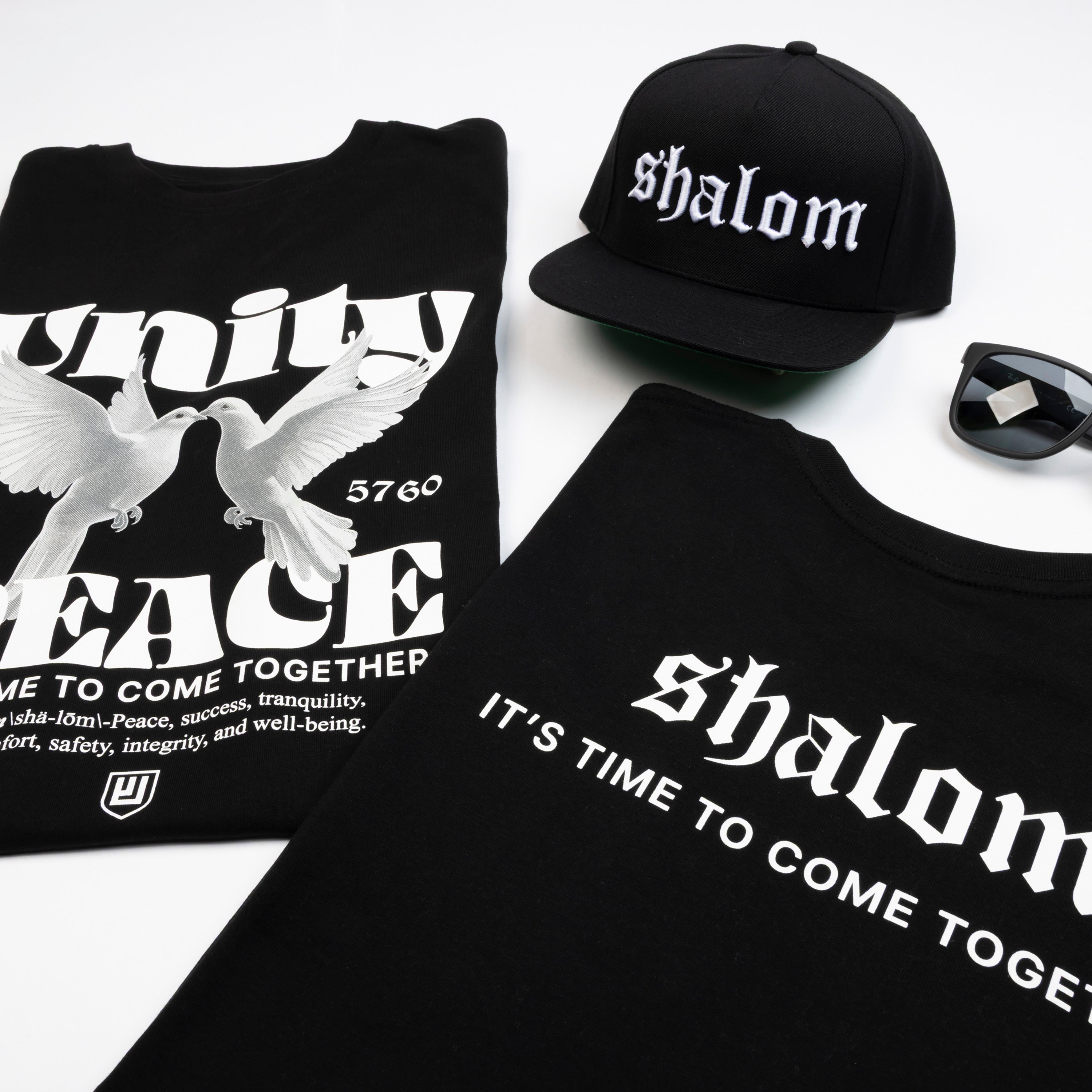 The Peace & Unity Hat is a symbol of connection, strength, and style. This Premium Five-Panel Snapback Cap is built on a classic Yupoong 5-panel pinch front, offering a perfect fit for most head sizes. Designed for those who stand for peace and togetherness, it’s the ideal everyday essential.
Pair it with our Peace & Unity Tees, Hoodies, and Definition Sweats for a complete look that spreads the message—because unity starts with you.