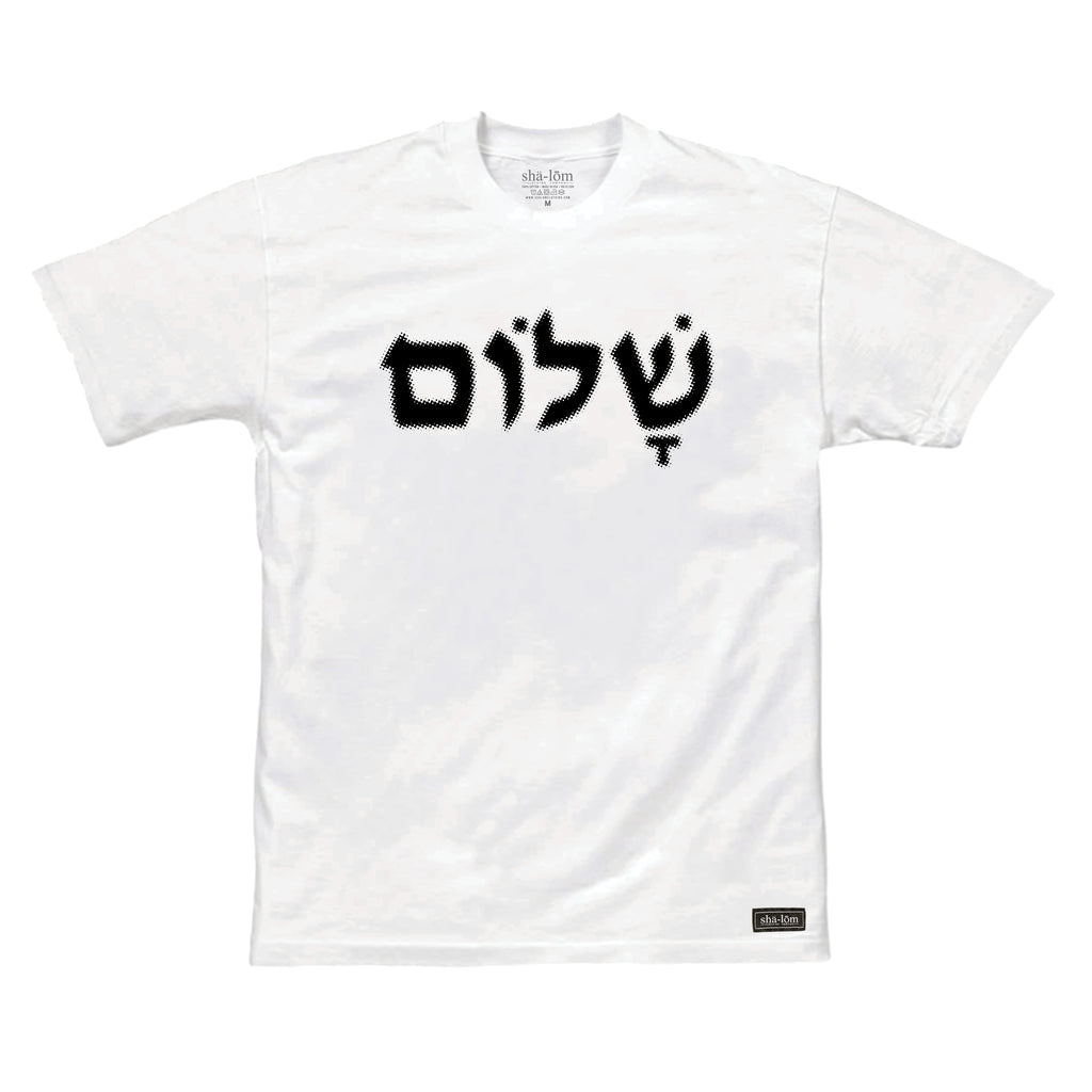 100% Ringspun Cotton Tee with shalom in hebrew. Hand screen printed in Santa Cruz CA with eco friendly water base inks. Custom shalom definition neck tag and shalom definition woven label sewn on the bottom left corner. Wear this garment in peace. Shalom Peace Every-Wear.