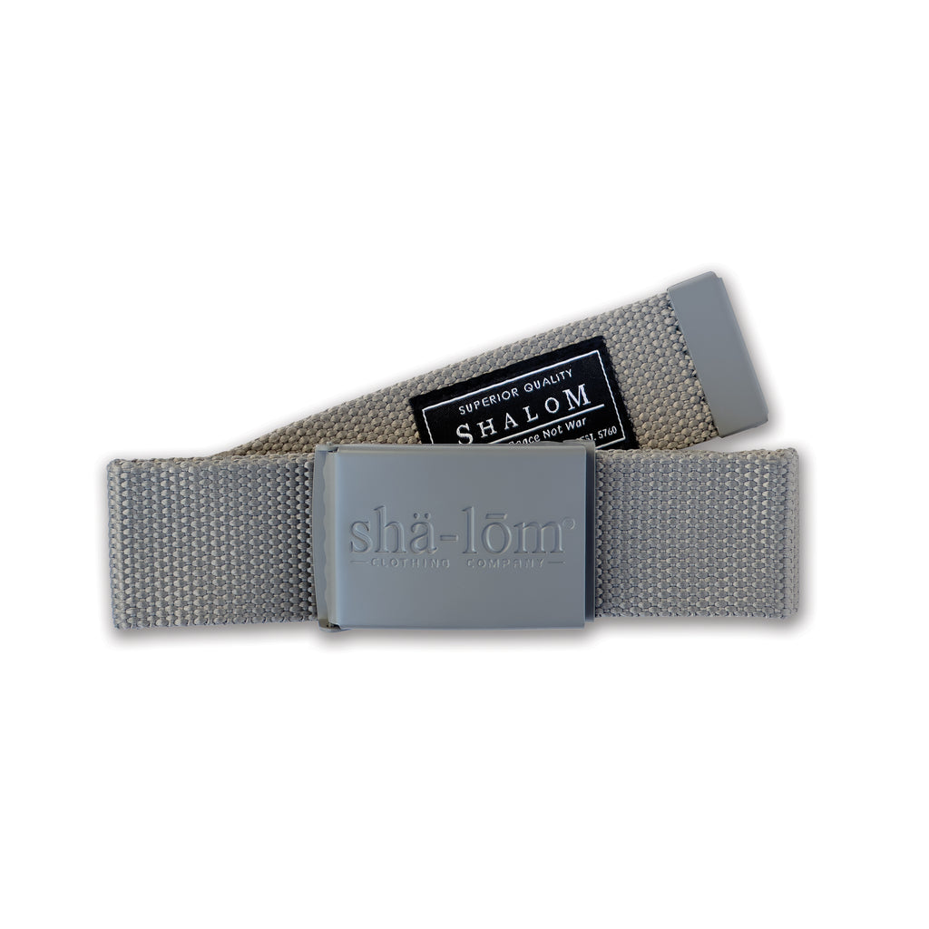 Introducing the Shalom Definition Web Belt—where style meets strength. Available in sleek black, cool grey, or bold gold, this belt is designed to withstand anything life throws your way. Crafted from top-tier materials for unbeatable durability, it’s the perfect blend of form and function. Whether you're dressing it up or keeping it casual, this belt delivers a timeless statement of Jewish pride and resilience.