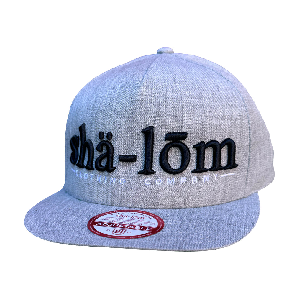 80% acrylic, 20% wool snapback hat with our Shalom Definition logo in 3DEmbroidery with a plastic snap closure.