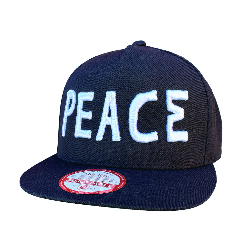 Celebrate the legacy of one of hip-hop's most influential groups with our exclusive "Peace Rhymes &amp; Life" hat. Inspired by A Tribe Called Quest's iconic album "Beats Rhymes &amp; Life," this design flips the script, blending the spirit of unity, lyrical mastery, and the essence of life. The bold graphic features the words "Peace" in a style that pays homage to the group's classic aesthetic, making it a must-have for true fans. Crafted from soft, high-quality cotton, this hat is not just a tribute—it's a