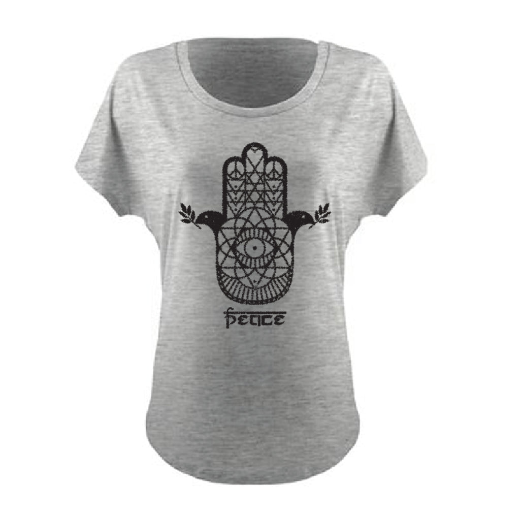 Here is our version of a Hamsa. 100% Ringspun Cotton Tee with the print on the front. Hand screen printed in Santa Cruz CA with eco friendly water base inks. Custom shalom definition neck tag and shalom definition woven label sewn on the bottom left corner. Wear this garment in peace. Shalom Peace Every-Wear. 