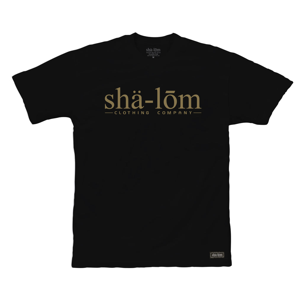 This is our main TRADEMARKED type face logo for the Shalom Clothing brand.100% Ringspun Cotton Tee with the Phonetic spelling of Shalom on the front. Hand screen printed in Santa Cruz CA with eco friendly water base inks. Custom shalom definition neck tag and shalom definition woven label sewn on the bottom left corner. Wear this garment in peace. Shalom Peace Every-Wear. 